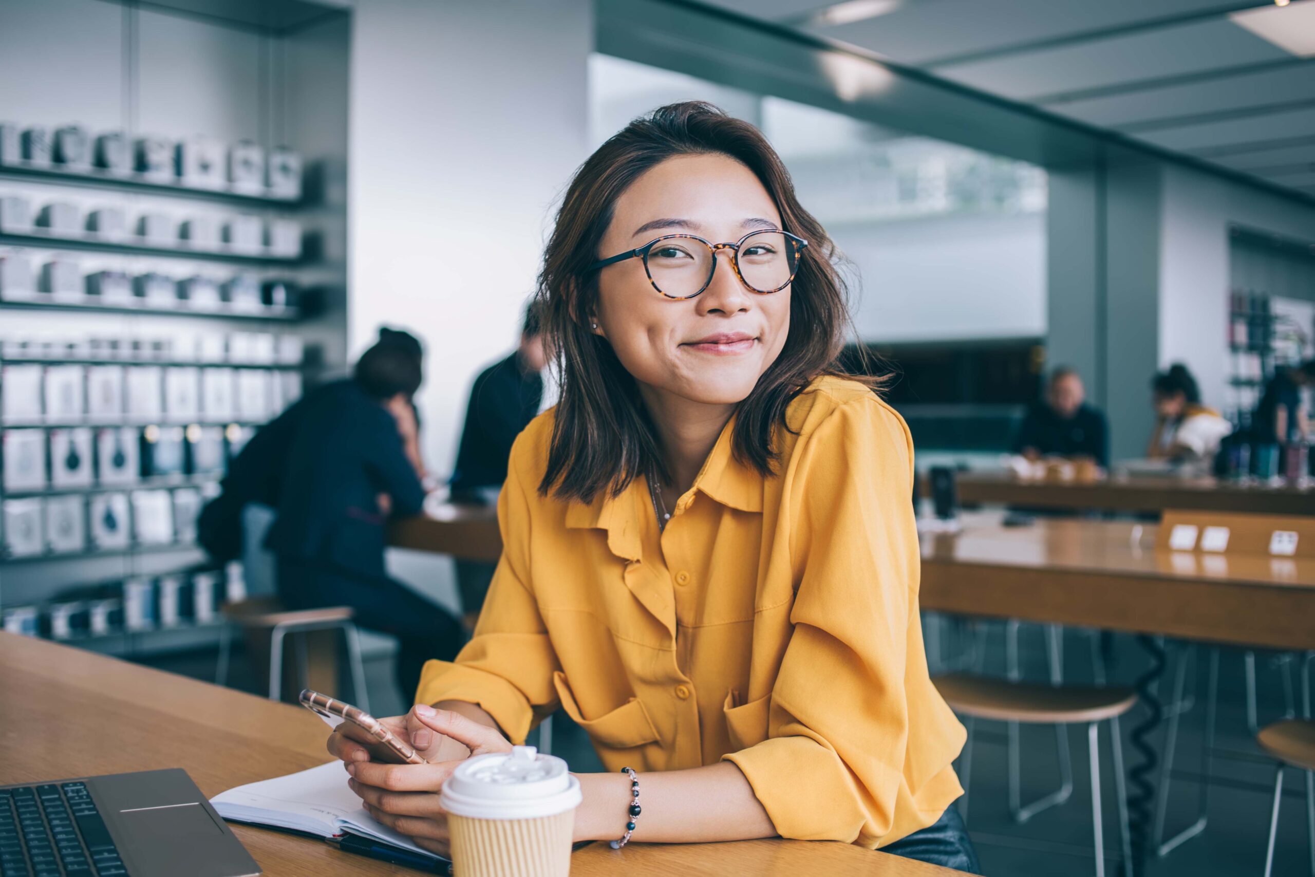 Portrait of cheerful Cambodian girl in the office